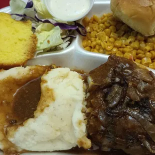 Hamburger steak, mashed potatoes, corn, salad with ranch, butter roll &amp; lemon cake plate $10.99