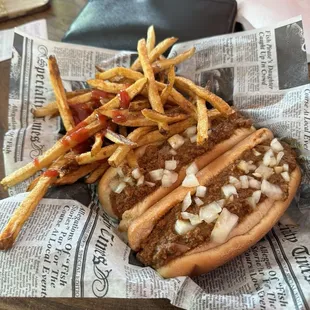 My tasty two hotdogs/ fries plate! Pregame supper! Wieners were deep fried!