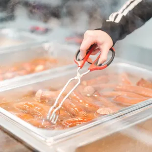 a person using a pair of scissors