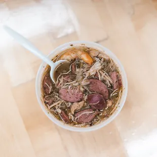 a bowl of soup with a spoon