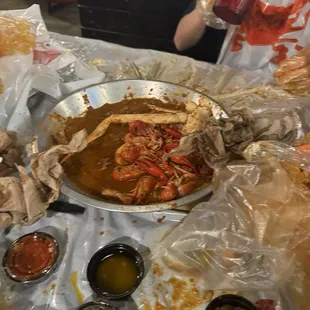 My family and I ate 4 clusters, 3 pounds of crawfish and one pound of shrimp.