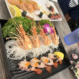 Amaebi, red clams, and seared salmon