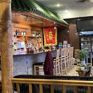 a view of a restaurant with a bar