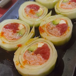 a tray of sliced onions and pepperoni