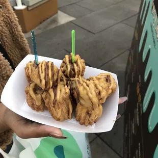 Crazy Churro bites filled with Nutella dip in peanut butter