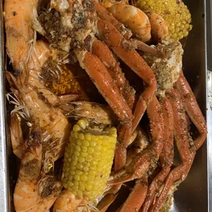 crab legs and corn on the cob