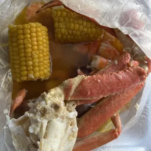Crab legs, corn, shrimp and butter
