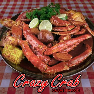 crab legs and corn on a plate