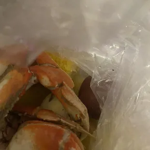 Dungeress crab with egg, potatoes and corn.