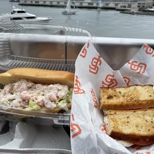a sandwich and a sandwich in a container