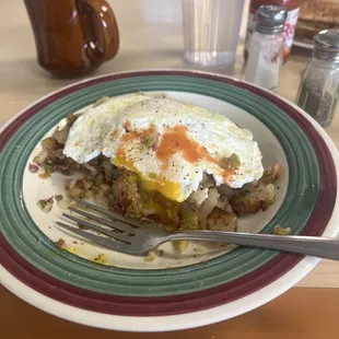 Corndbeef hash and eggs.