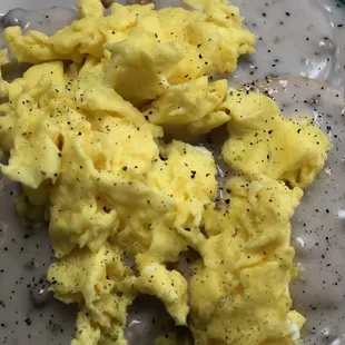 a plate of scrambled eggs