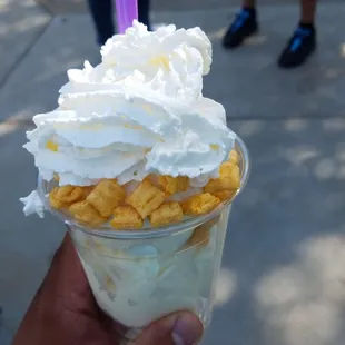 vanilla yogurt with whipped cream and cap'n crunch