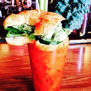 Avocado chicken salad croissant sammich on my Bloody Mary!