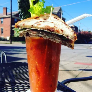 Whipped smoked blue cheese, arugula, pear and prosciutto sammich on cinnamon raisin bread