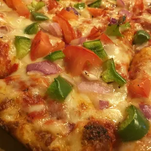 Large with onion, green pepper and tomatoes and garlic butter crust.