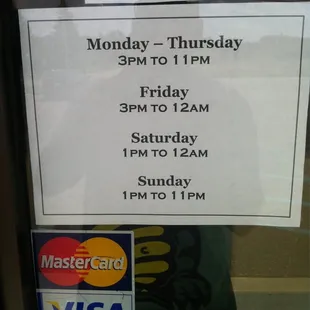 a sign on the door of a restaurant