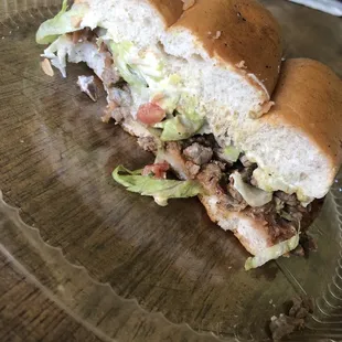 Asada Torta (refried beans, meat, cheese, lettuce tomato, mayo, guacamole) The bread is so soft!