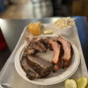 Insanely Good ($17.99) ribs with pulled pork and brisket with creamy slaw.