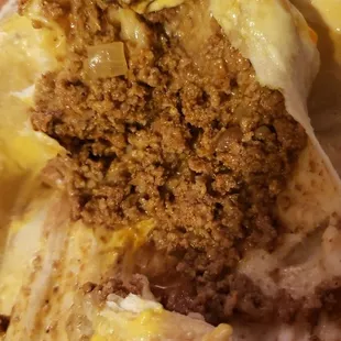 Ground beef inside Chimicanga. Actual flavor and seasoning  unlike some other places. 10/10 in taste.
