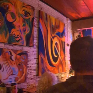 The saloon has such an eclectic feel, including beautifully abstract art all over the brick walls.