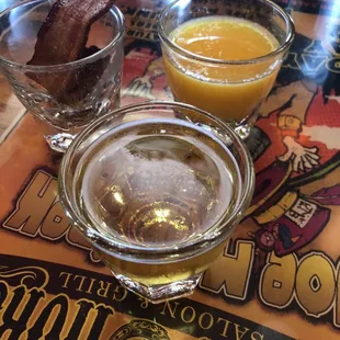 Breakfast Shot!!! Jameson/butterscotch schnapps OJ and a slice of Bacon