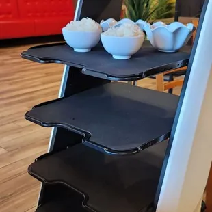 Our food served through our robotic friend. However, we were mainly served by a human.