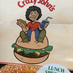 a kid sitting on a burger