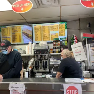 a man and a woman at the counter
