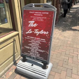 a sign on the sidewalk