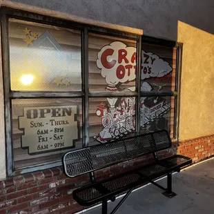 a bench in front of a window