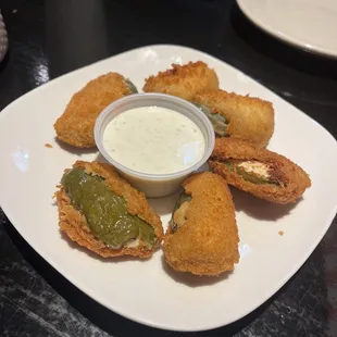 Hand breaded cream cheese jalapeño poppers