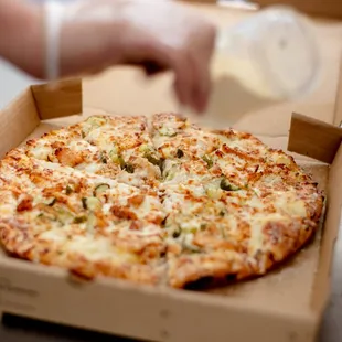 a pizza in a pizza box