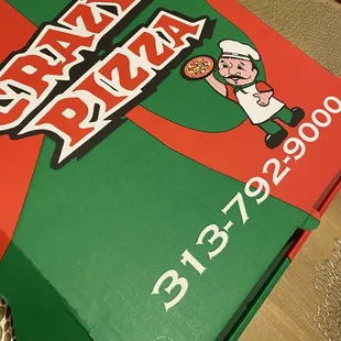 a pizza box on a table