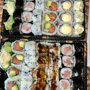 Top: Red Snapper, Salmon Avocado, Ginza Roll Bottom: Salmon Avocado, Eel Avocado Roll, Yellowtail with Scallion