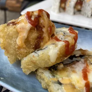 a piece of sushi on a plate