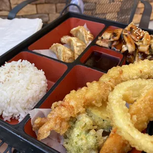 a bento box of food