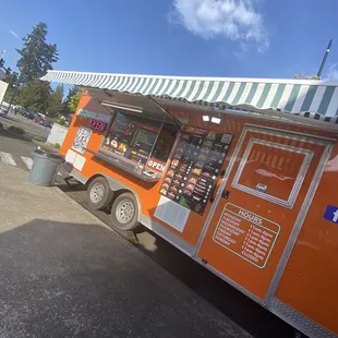 a food truck parked in a parking lot