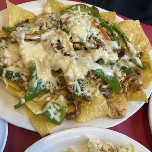 Fajita nachos and chicken chimichanga nachos fajita
