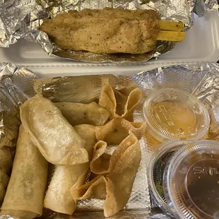 A8. Crazy Combo - 2 chicken satay, 2 crab rangoon, 2 spring rolls, 2 dumplings (all with dipping sauces)