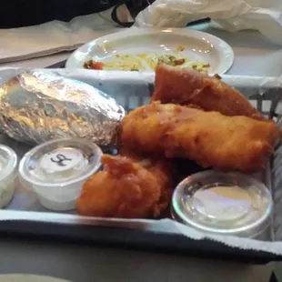 Friday fish fry featuring deep fried cod, Many sides to choose from,I got a baked potato and coleslaw. Hot and crispy the way it should be.