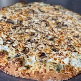 The Chicken Florentine - Spinach Alfredo base with garlic grilled chicken and fresh mushrooms... a savory favorite