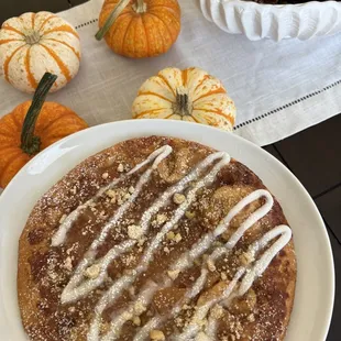 The New Apple Pie Pizza! Apple Pie Filling on a thin sheet of cinnamon with a crumbled struesel cookie and icing on top... Perfect for Fall!