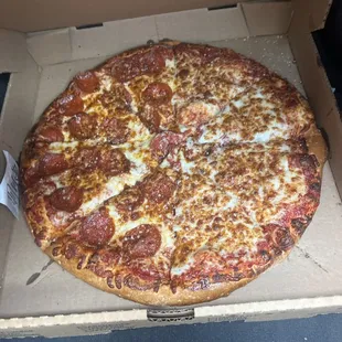 Large half cheese half pepperoni pizza