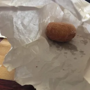 I almost forgot to take a pic. I had 1 donut left and remembered. They serve these warm. Big and tastes good.