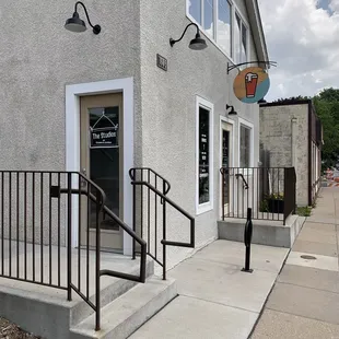 Entrance. Outdoor patio to left.