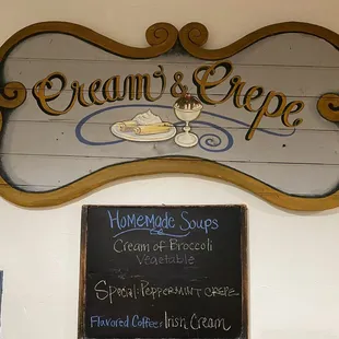 a sign for cream and crepe
