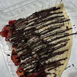 chocolate drizzle on a crepe