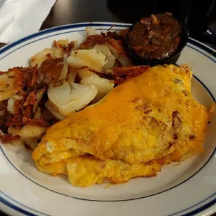 Meat lovers omelet, country potatoes, side of bacon jam