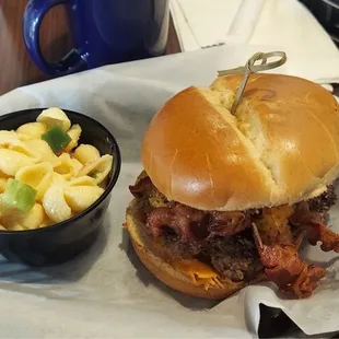 Burger with pasta salad